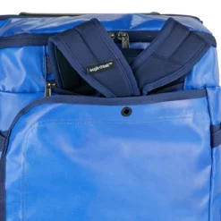 Eagle Creek Cargo Hauler XT Wheeled Duffel 36L, Aizome Blue -Koffer Verkaufs-Shop compressed OVERARCHING VIEW 325 TUCKAWAY STRAPS